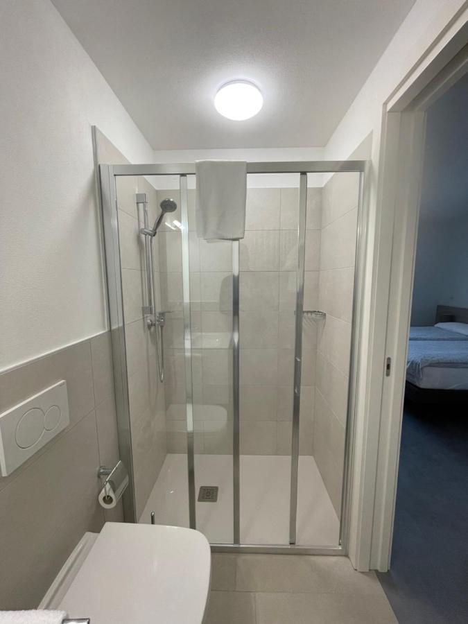 Hotel Della Stazione Maroggia Bagian luar foto